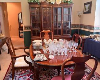 Queen Anne cherry dining table and chairs with china cabinet