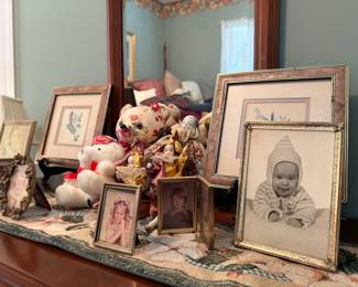Vintage framed photos and plush toys