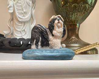 Shih Tzu dog figurine on pillow