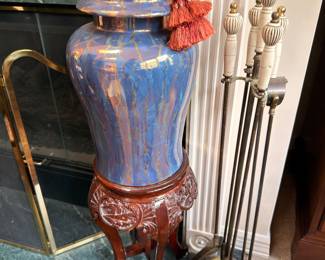 Large blue ginger jar on carved stand, fireplace tools
