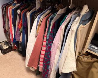 Closet of women's blouses and cardigans