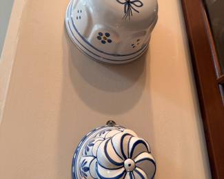 Blue and white ceramic wall pockets