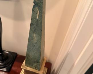 Green marble obelisk on brass base