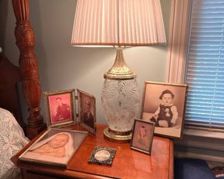 Crystal table lamp on cherry nightstand
