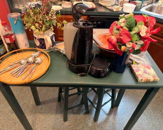 Green kitchen island table with bar stools