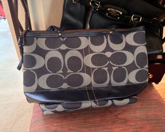 Coach signature canvas shoulder bags
