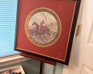 Framed fox hunt print on wooden display easel