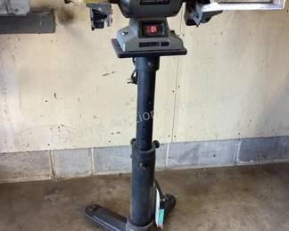 Pedestal bench grinder