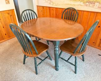 Cute kitchen table and chairs with extra leaf