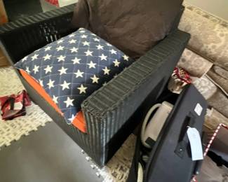 Wicker chair; luggage