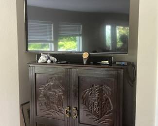 TV; carved wood cabinet