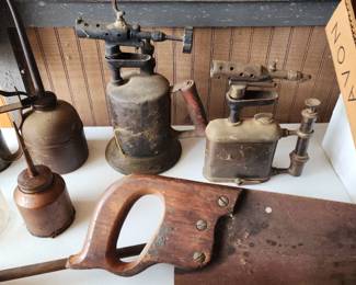 Antique oil cans and torches
