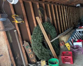 Large wreath and unopened tall Christmas tree