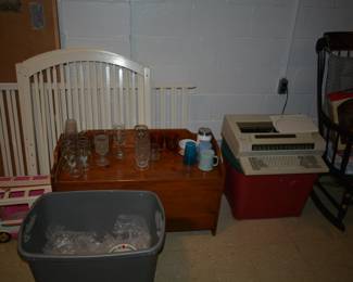 chest, rocking chair, typewriter 