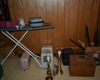 Heaters, BB guns, old sewing machine in wood box