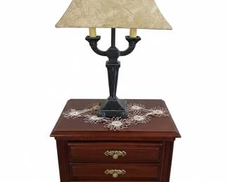 Traditional Cherry Finish ThreeDrawer Nightstand with Ornate BrassToned Pulls and Table Lamp