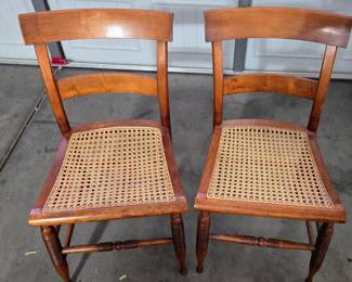 Pair of vintage wood chairs with hand cane seats