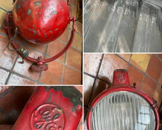 More views of the vintage General Electric fire boat ship floodlight with a red metal housing and ribbed Top Spredlite glass lens