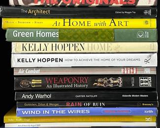 Books including Vertical Living Spaces, At Home With Art, Air Combat The New Face of War, Weaponry An Illustrated History, Wind in the Wires, A Japanese Touch For Your Garden