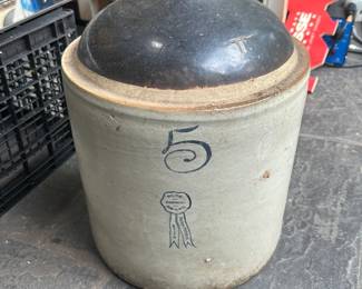 Antique 5-gallon Buckeye Pottery "Blue Ribbon Brand" salt-glazed two-toned stoneware whiskey jug. Buckeye Pottery operated from the late 1800s until the 1930s.