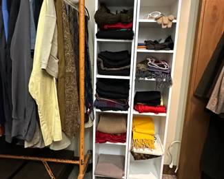 Scarves and mufflers in a variety of colors and fabrics; men's ties, vintage sewing patterns in original packaging