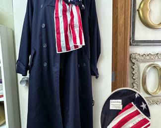 A women's vintage Calvin Klein classic navy blue double-breasted trench coat, and a Perry Ellis American flag patterned scarf