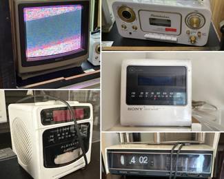 A vintage Sony Trinitron KV-1206 color television set, a vintage 1980s Soundesign white "cube" style clock radio with a built-in cassette player, a Studebaker SB2135WG portable CD player and radio, a vintage Sony Dream Machine Digicube ICF-C11W AM/FM clock radio, and a vintage 1970s Sony Digimatic TFM-C650W flip clock radio