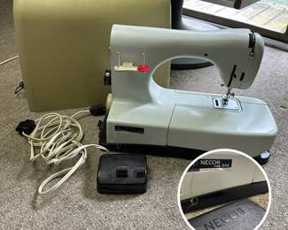 A vintage Necchi Lydia MK2 Type 544 sewing machine with carrying case, manufactured in Italy during the 1960s