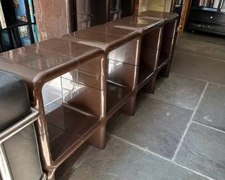Seven elements from the ultra-rare ‘UMBO’ Modular Shelving System by Kay Leroy Ruggles for Directional. This design was first published in New York magazine on September 25, 1972; the units in this group are in a rich chocolate brown color.