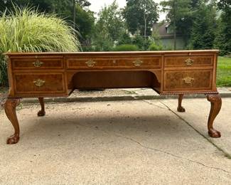 Antique Leather Top Baker Furniture Desk H: 30 1/4 x W: 72 x D: 36 in. Has 3 pull out writing shelves.