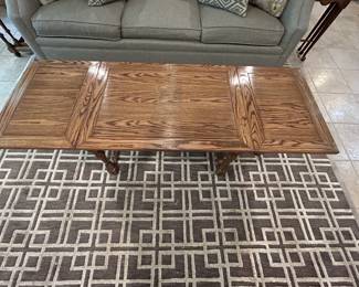 Vintage oak paneled coffee table with turned legs