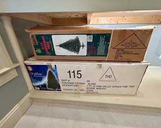 Two artificial Christmas trees, 6-7 ft, boxed