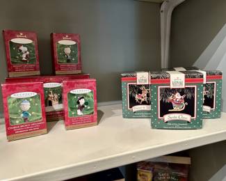Hallmark Keepsake Peanuts & Santa ornaments, complete sets