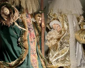 Pair of woodland-style Santa figures, green & gold robes
