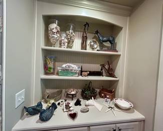 Shelf lot of animal figurines, shells, clock, decor