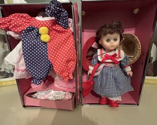 Vintage doll with case, extra outfits & accessories