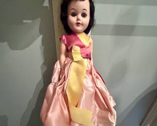 Vintage hard plastic doll, satin gown, dark hair
