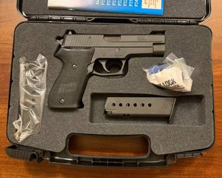 Sig Sauer P220 .45 Caliber With 8 Round Clip, Safety Lock And Case