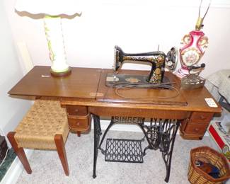 Vintage singer sewing machine, antique foot stool, vintage lamps