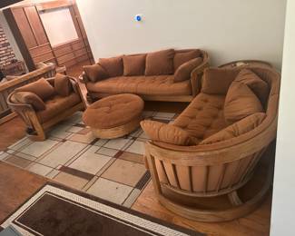 1970s Howard furniture. Sold by piece , choice of 2 sofas $250 each. 1 loveseat $200. 2 chairs $ 175 each. 1 coffee table $175.00. 1 circle side table shown between the sofa and loveseat $ 125.00. Three half moon tables $ 125.00 each. Magazine rack $50.