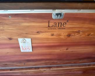 $75 beautiful lane cedar chest with key, padded seat for extra seating space.