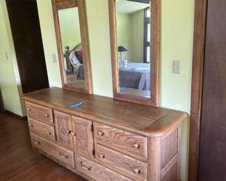 Sold separately oak master bedroom set, the double mirror dresser $225 eight drawers. 74x20. Six drawer chest $225.00 48 tall 40 across 18 deep. Choice of 2 matching nite stands $125