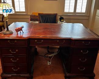 Handsome leather top partners desk
