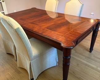 Ralph Lauren Regency Flame Mahogany Dining Table - 80" L x 48" W and has two Additional 22" Deep Leaves