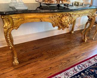 Ornate carved giltwood console table