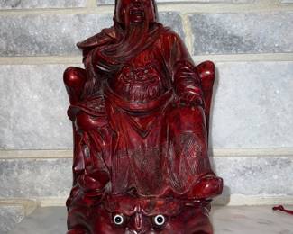 Figurine of Guan Yu seated on an ornate base