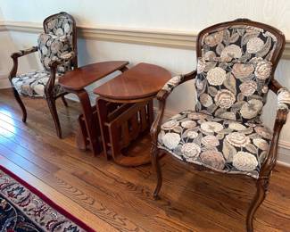 French style floral armchairs and vintage wooden side table