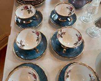 Vintage teal and gold-trimmed porcelain teacup set