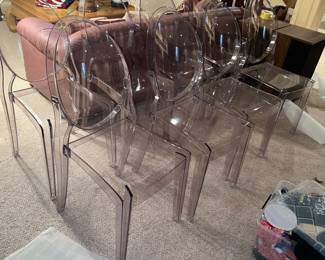 Transparent oval-back accent chairs by Legacy Mirage