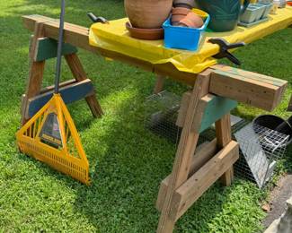 2 wooden saw horses